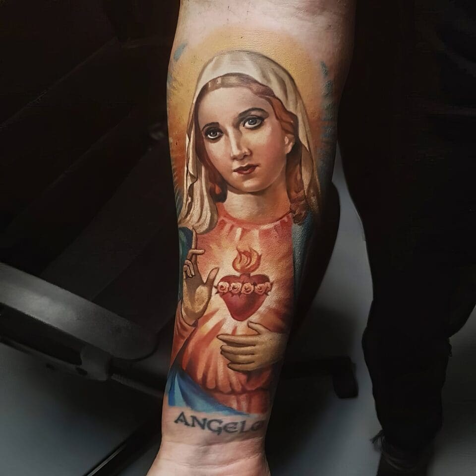 small catholic tattoos 44